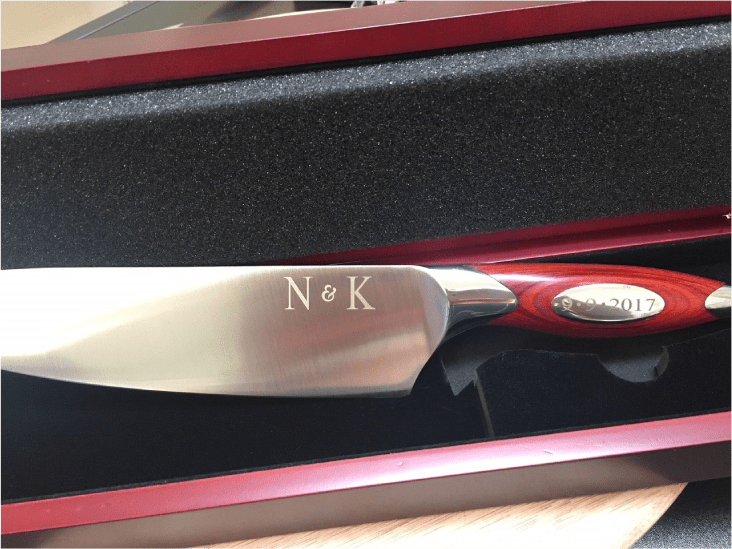 blade with the initials "N & K" etched into it